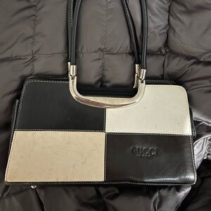 Black, white and beige Gucci purse